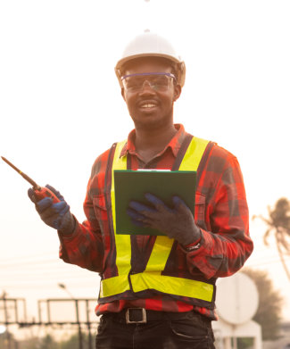 man standing and holding folder