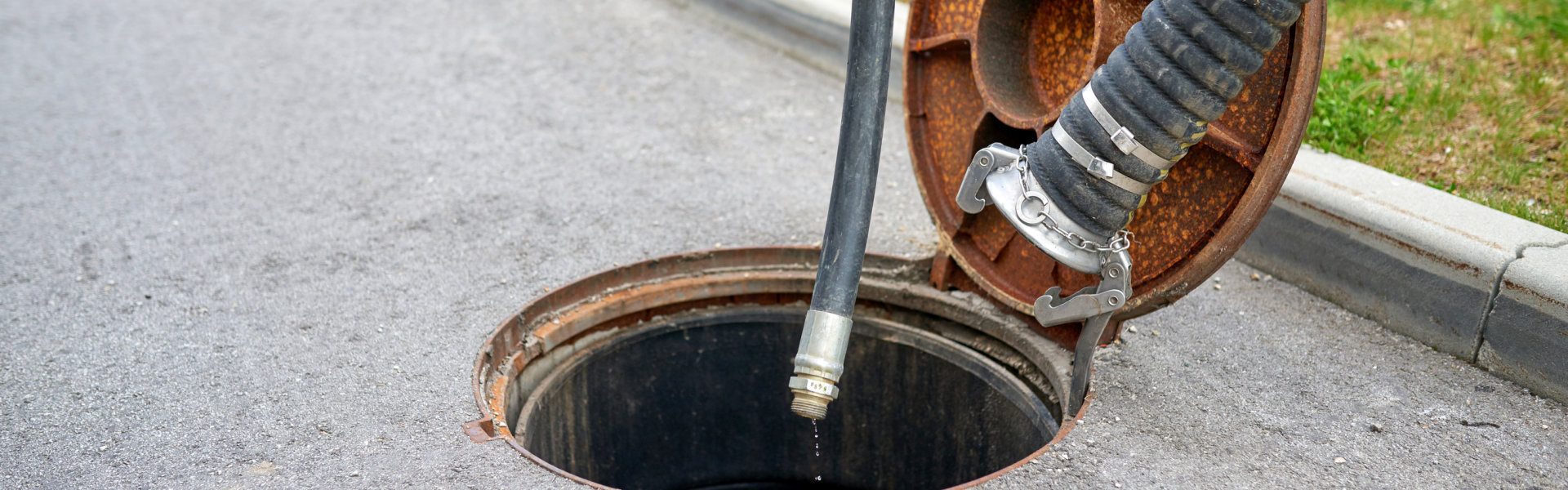 cleaning sludge from septic system