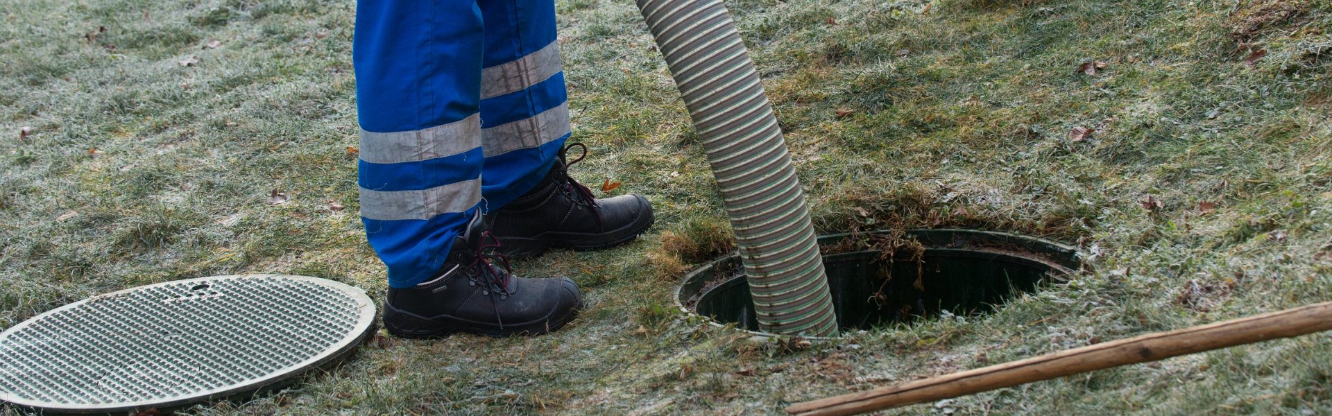 cleaning sludge from septic system